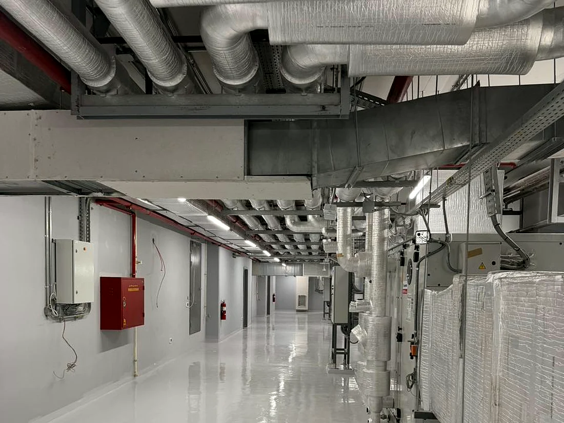 Colour-coded MEP services installed to a coordinated design by Mecamac