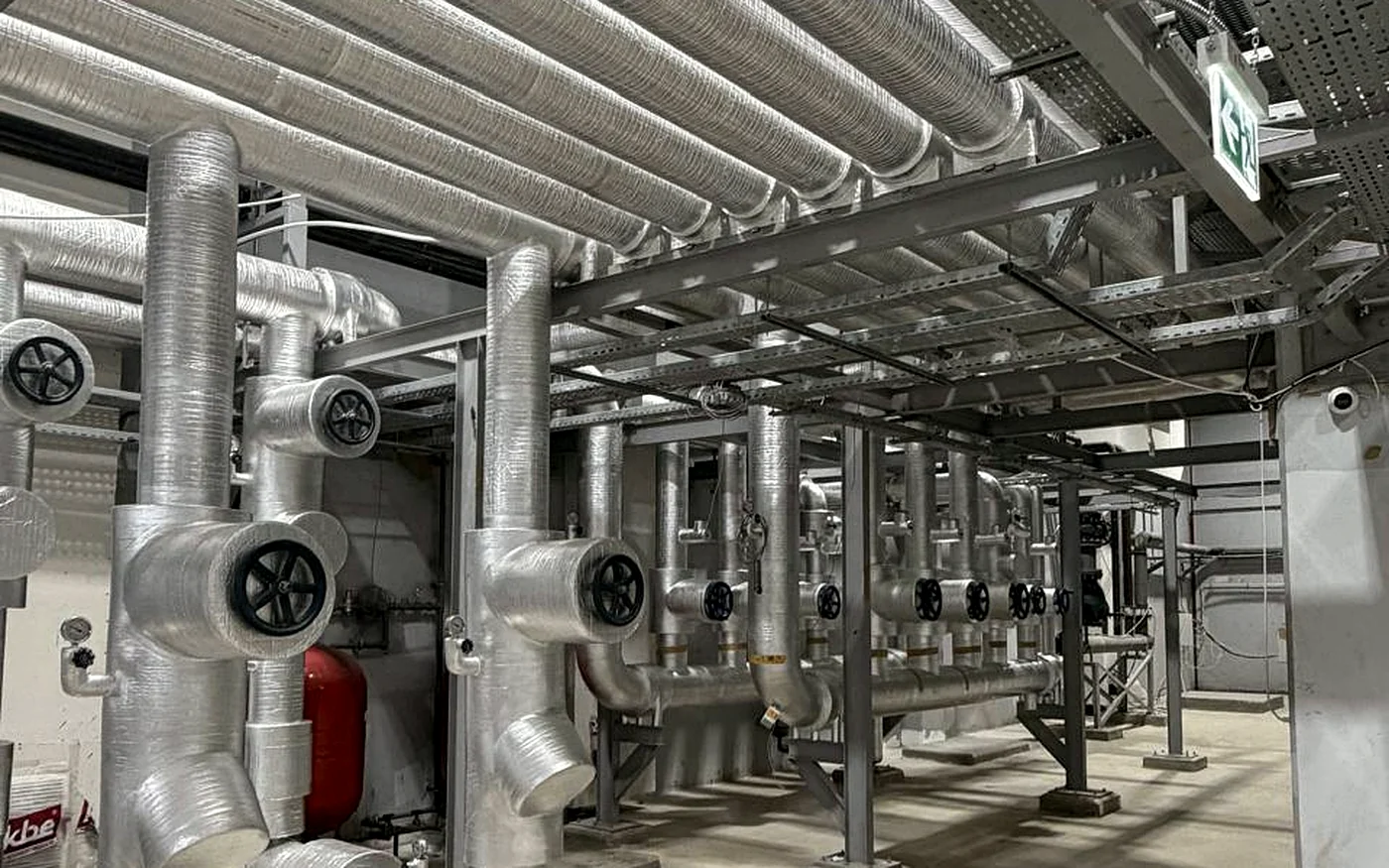 Chilled water pump room with insulated pipework and isolation valves, installed and commissioned by Mecamac in Oman