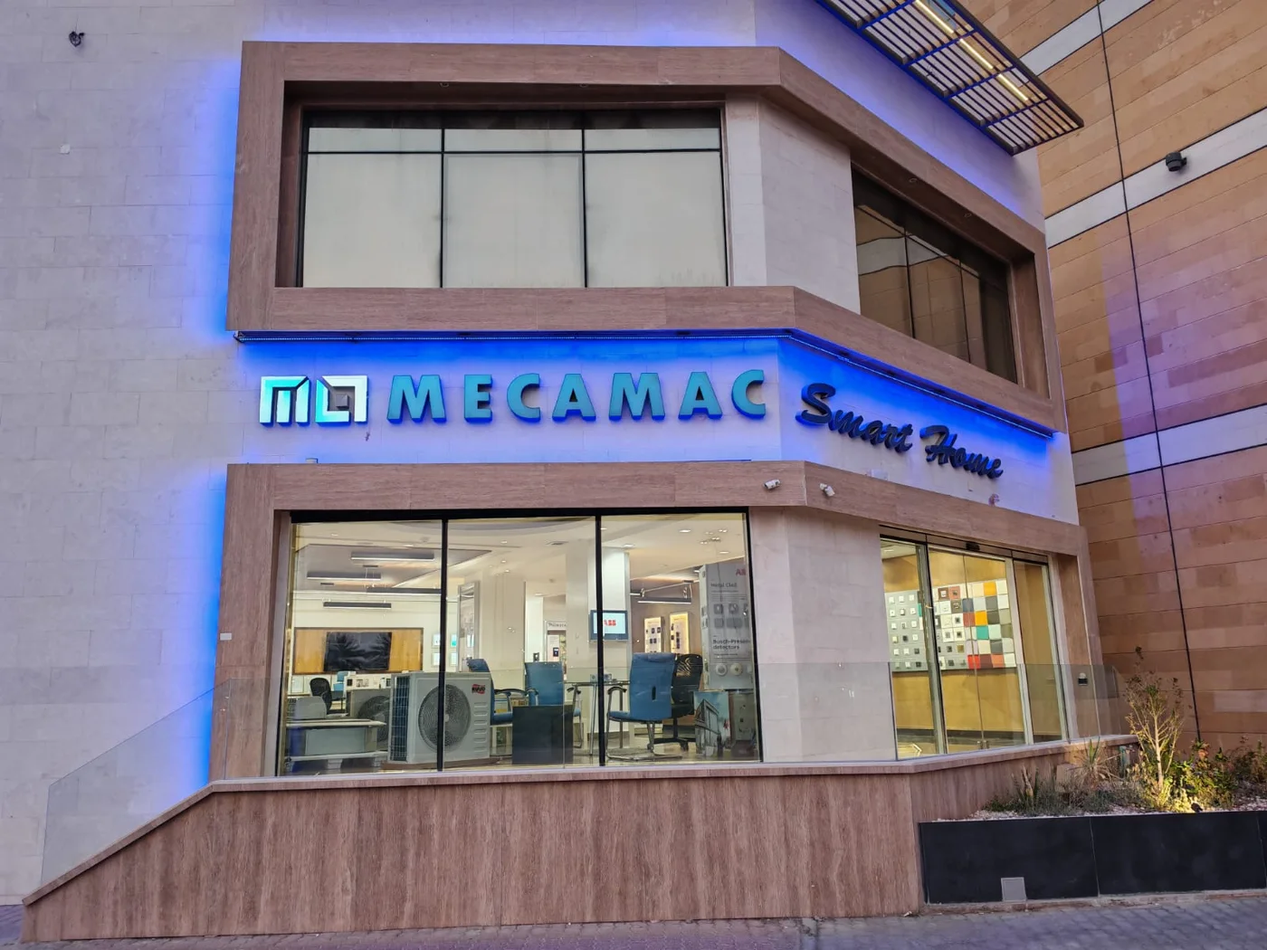 Mecamac Smart Experience Centre — Bank Muscat Building, Qurum, at dusk